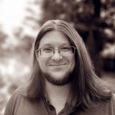 Headshot in black and white of Ryan Hampton